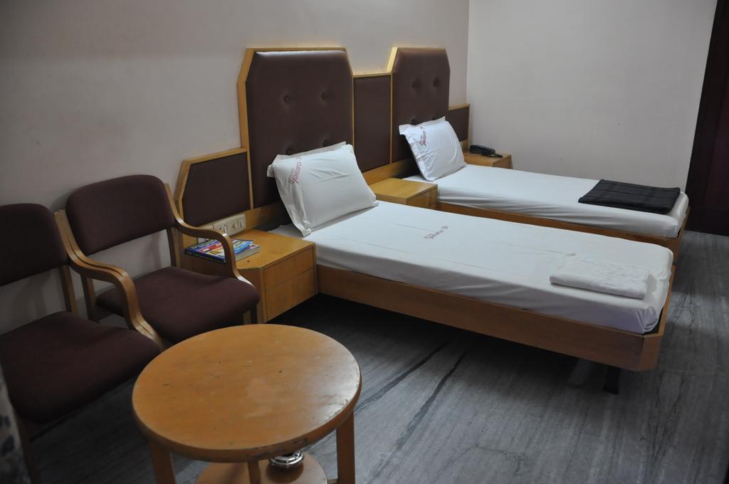 Hotel Pearls Madurai Quarto foto
